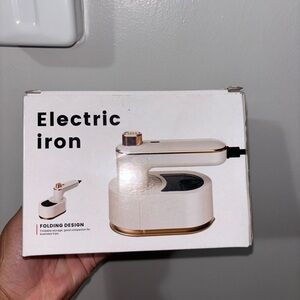 Compact White and Gold Electric Iron